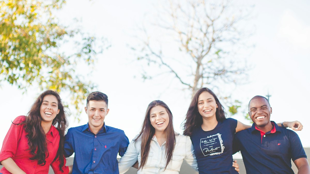 A group of young people smiling